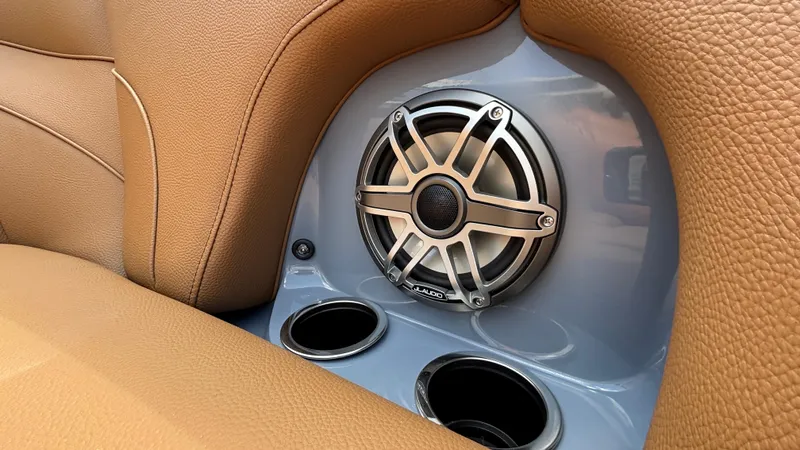 Slide: The Image of 2025 MB B52 23 Alpha interior with premium speaker and cup holders. - 22