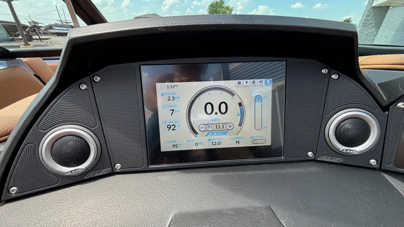 Slide: The Image of Dashboard of 2025 MB B52 23 Alpha boat with digital display and speakers. - 26