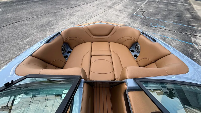 Slide: The Image of Luxurious interior of 2025 MB B52 23 Alpha boat with tan leather seating. - 30