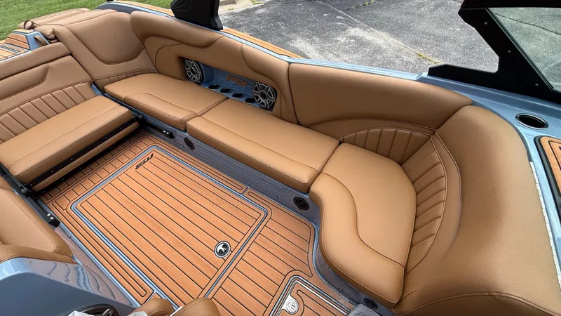 Slide: The Image of Luxurious interior of 2025 MB B52 23 Alpha boat with tan leather seating. - 32