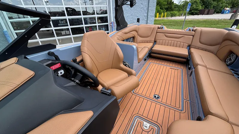 Slide: The Image of Luxurious interior of 2025 MB B52 23 Alpha boat with tan leather seating. - 34