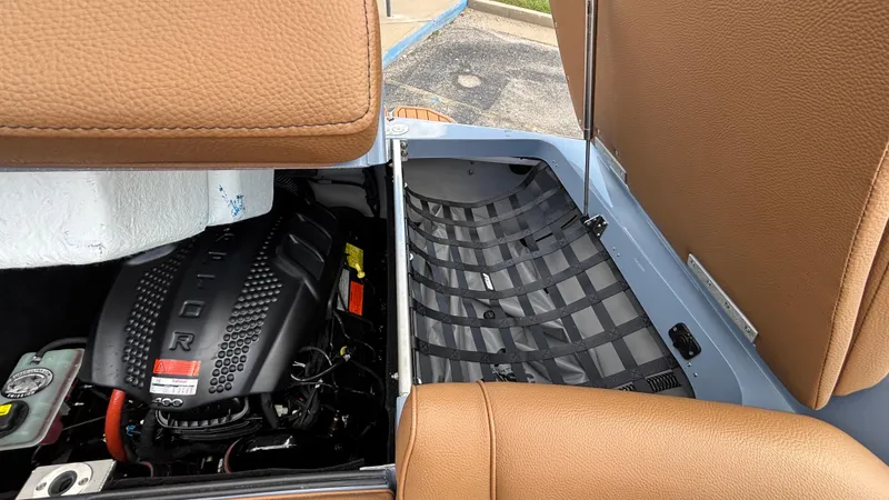 Slide: The Image of Open engine compartment of 2025 MB B52 23 Alpha with tan interior. - 41