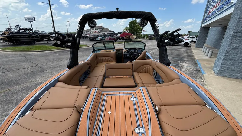 Slide: The Image of Luxurious 2025 MB B52 23 Alpha boat interior with tan seating and sleek design. - 45