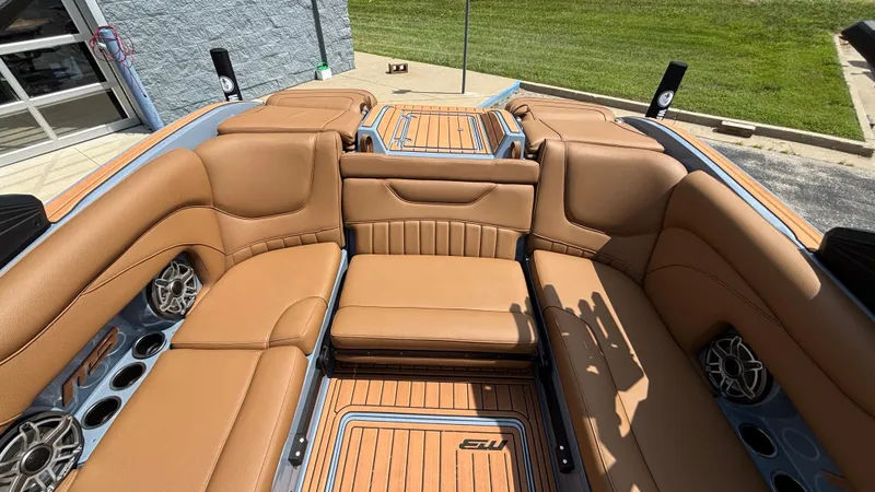 Slide: The Image of Luxurious interior of 2025 MB B52 23 Alpha boat with tan leather seating. - 6