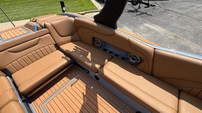 Slide: The Image of Luxurious interior of 2025 MB B52 23 Alpha boat with tan leather seating. - 8