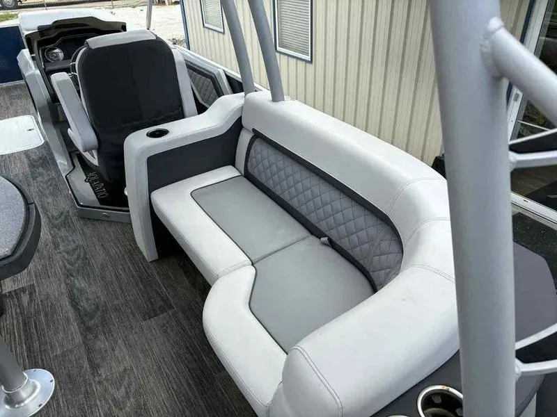 Slide: The Image of 2023 Godfrey AquaPatio 255 SDC interior with modern seating and sleek design. - 13