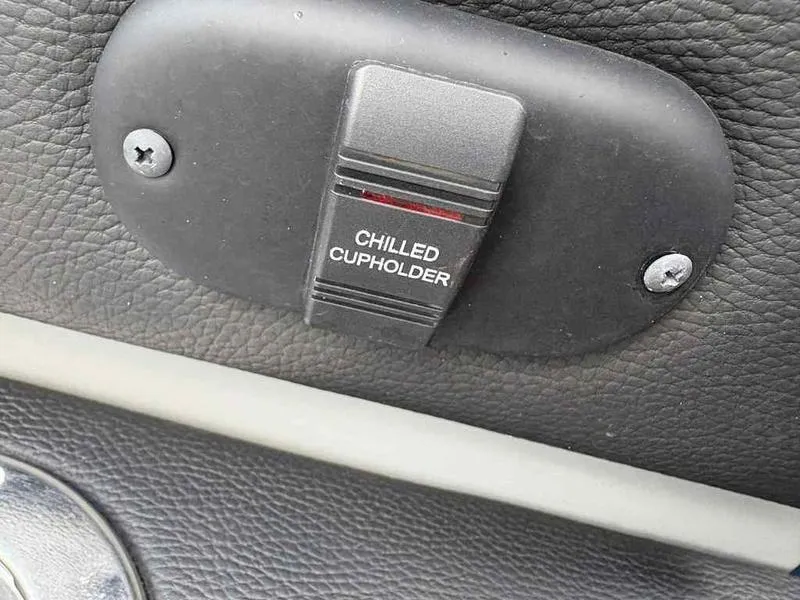 Slide: The Image of Chilled cupholder switch on 2023 Godfrey AquaPatio 255 SDC boat. - 20