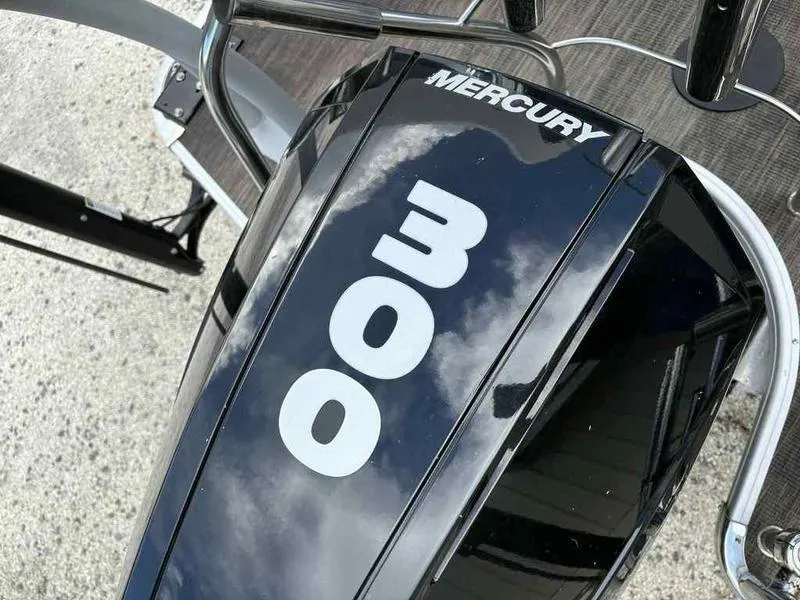 Slide: The Image of Mercury 300 outboard motor on 2023 Godfrey AquaPatio 255 SDC boat. - 25