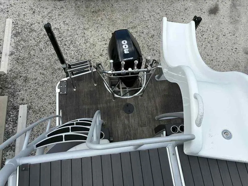 Slide: The Image of 2023 Godfrey AquaPatio 255 SDC boat with slide and motor, top view. - 5