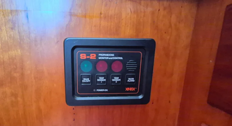 Slide: The Image of Control panel on 1997 Able 44 Downeast Express Cruiser, featuring propane/CNG monitor. - 18