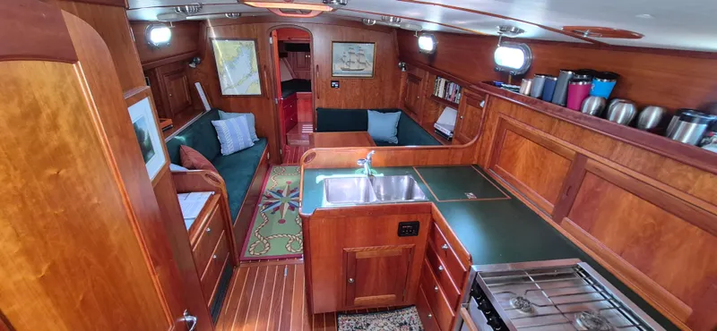 Slide: The Image of Interior of 1997 Able 44 Downeast Express Cruiser with wood finish and modern amenities. - 20