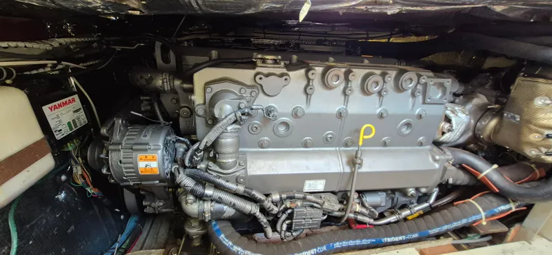 Slide: The Image of Engine compartment of a 1997 Able 44 Downeast Express Cruiser with Yanmar components. - 40