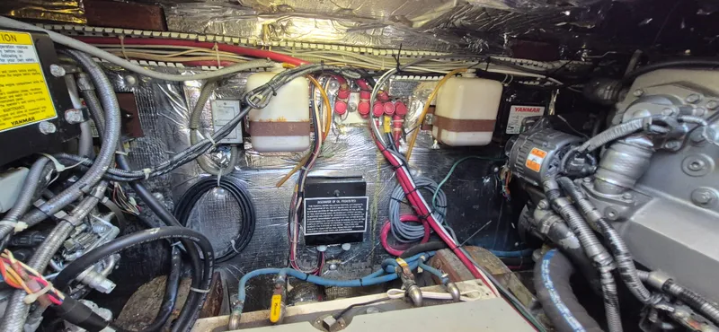 Slide: The Image of Engine room of 1997 Able 44 Downeast Express Cruiser with wiring and components. - 42