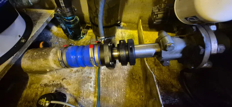 Slide: The Image of Engine room of 1997 Able 44 Downeast Express Cruiser showing mechanical components and connections. - 45