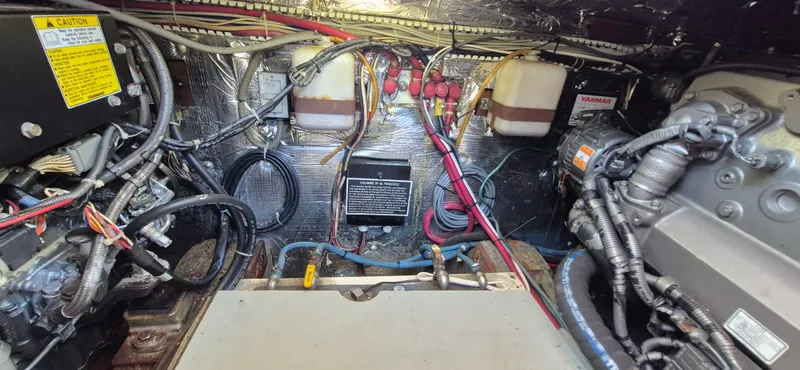 Slide: The Image of Engine room of 1997 Able 44 Downeast Express Cruiser with Yanmar components and wiring. - 48