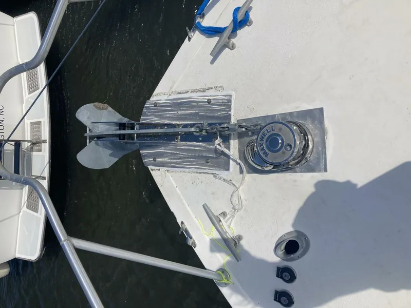 Slide: The Image of Bow of 1989 Topaz Sportfisherman with anchor and Maxwell windlass system. - 7