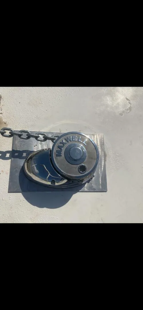 Slide: The Image of Anchor winch on 1989 Topaz Sportfisherman boat deck. - 8