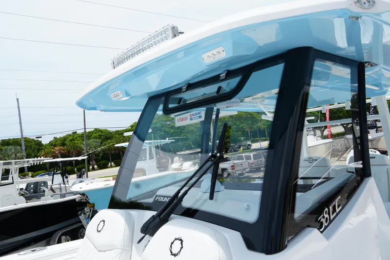 Slide: The Image of 2025 Fountain 38 CC boat with sleek windshield and modern design. - 10