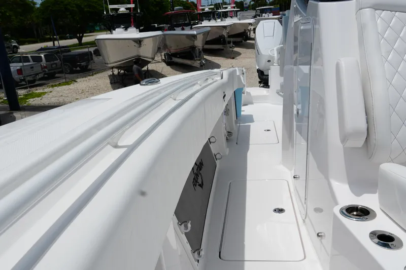 Slide: The Image of 2025 Fountain 38 CC boat interior with sleek white design and modern features. - 15