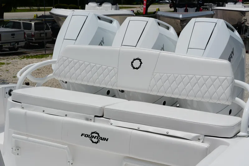 Slide: The Image of 2025 Fountain 38 CC boat with triple Mercury engines and diamond-stitched seating. - 25