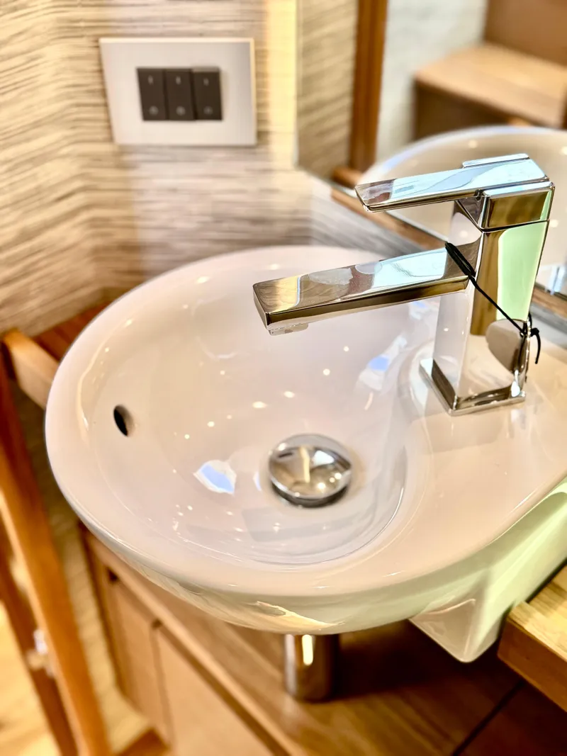 Slide: The Image of Modern bathroom sink with sleek faucet in 2025 Tiara Yachts 43 LE. - 45