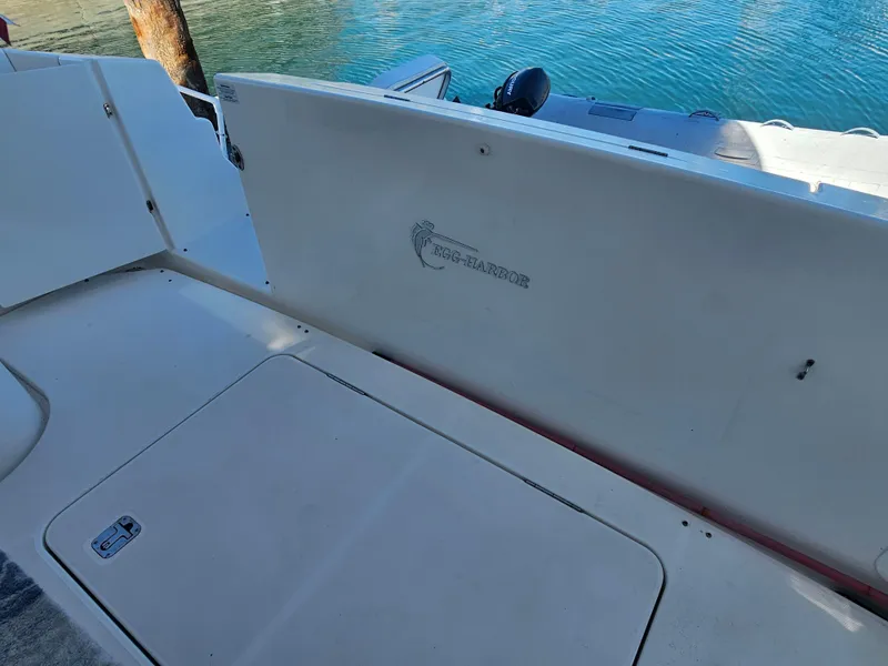 Slide: The Image of 2012 Silverton West Coast Edition boat deck with water view. - 13