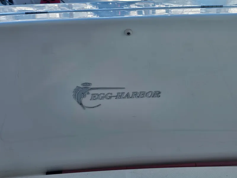 Slide: The Image of Egg Harbor logo on 2012 Silverton West Coast Edition boat. - 14