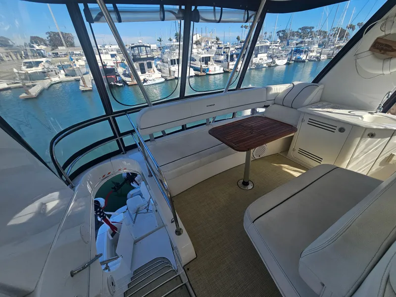 Slide: The Image of Luxurious 2012 Silverton West Coast Edition yacht interior with marina view. - 17