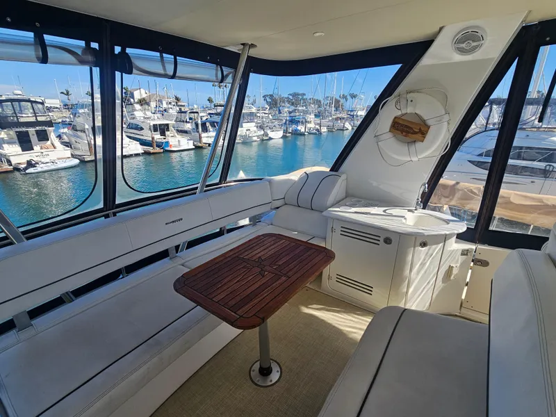 Slide: The Image of Luxurious 2012 Silverton West Coast Edition yacht interior with marina view. - 30