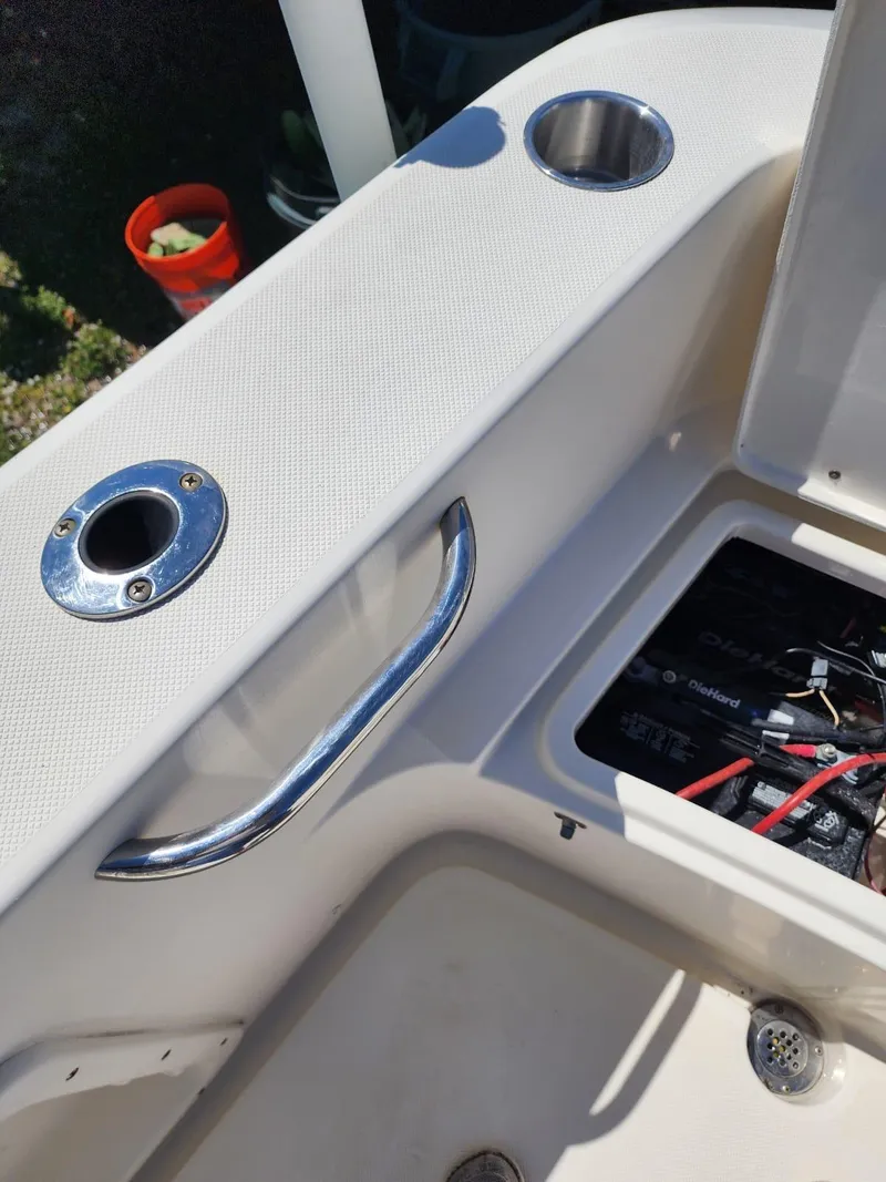 Slide: The Image of 2017 Bulls Bay 230 Center Console boat wiring and storage compartment detail. - 14