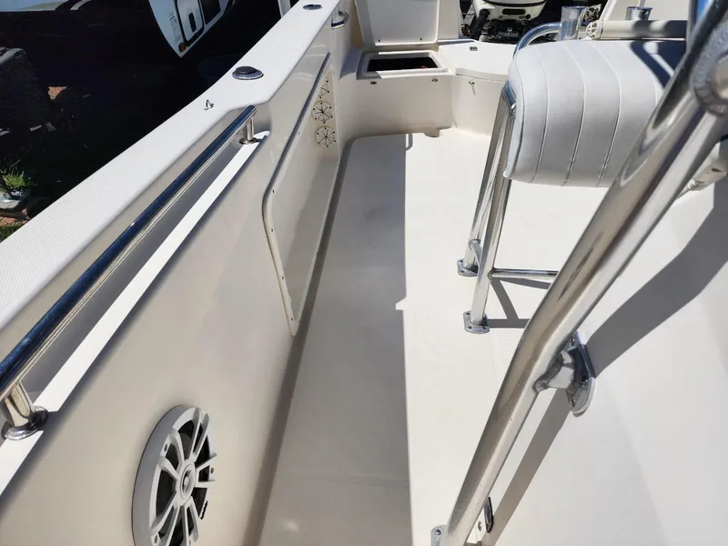 Slide: The Image of 2017 Bulls Bay 230 Center Console dashboard with gauges and controls. - 22