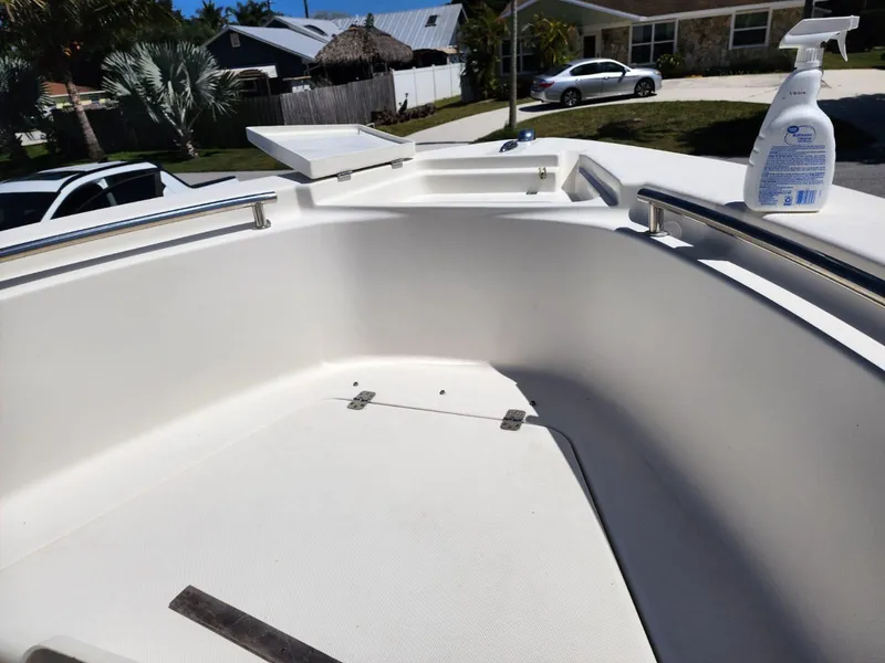Slide: The Image of 2017 Bulls Bay 230 Center Console boat interior with seating and speaker. - 24