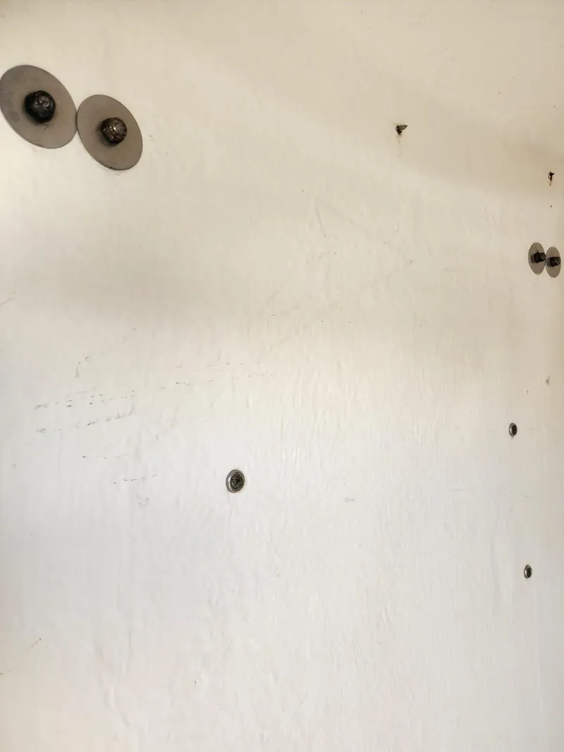 Slide: The Image of Open storage compartment on 2017 Bulls Bay 230 Center Console boat. - 31