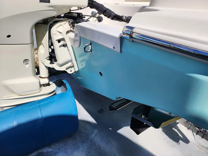 Slide: The Image of 2017 Bulls Bay 230 Center Console boat on trailer, parked on roadside. - 40