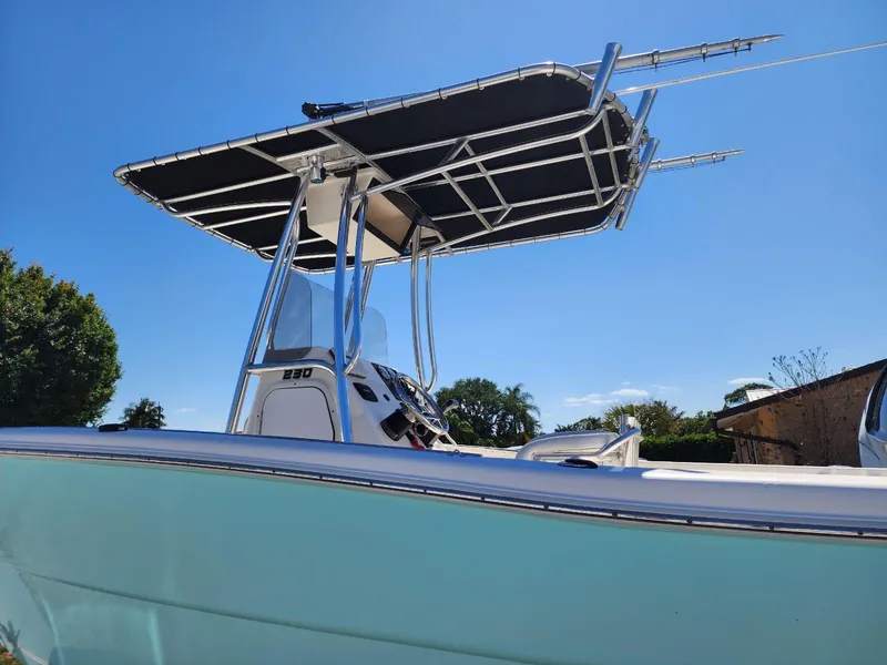 Slide: The Image of 2017 Bulls Bay 230 Center Console boat on trailer, showing hull and exhaust ports. - 41