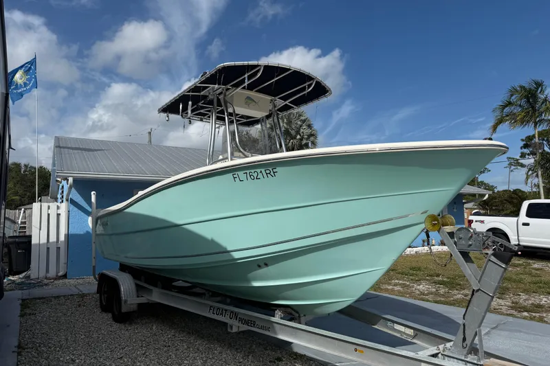 Slide: The Image of 2017 Bulls Bay 230 Center Console boat on trailer under cloudy sky. - 61