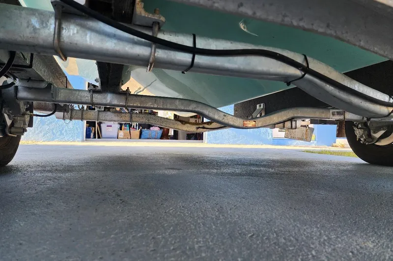 Slide: The Image of Underside view of a 2017 Bulls Bay 230 Center Console boat on a trailer. - 63