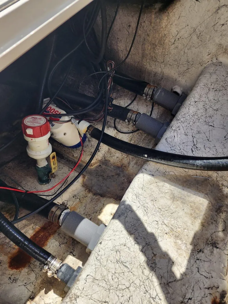 Slide: The Image of 2017 Bulls Bay 230 Center Console boat trim tab detail. - 9