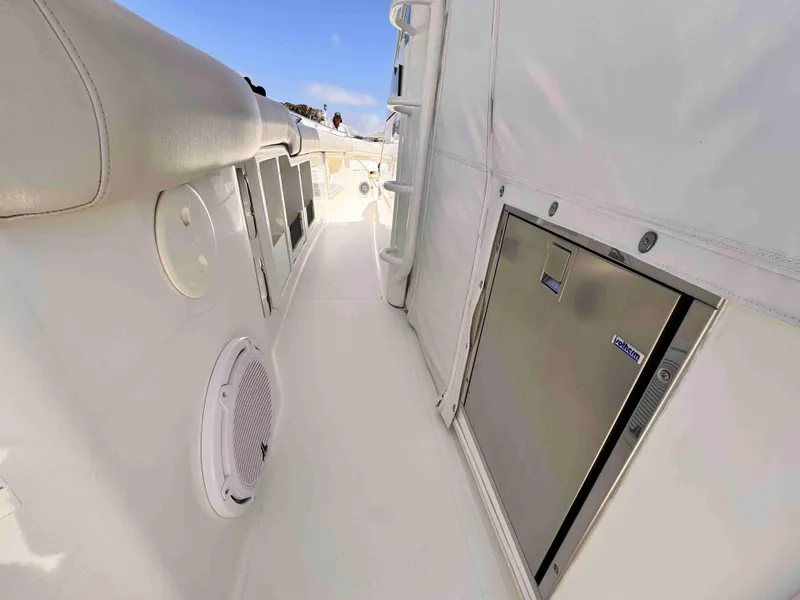 Slide: The Image of 2018 Boston Whaler 350 Outrage interior with stainless steel features and seating. - 21