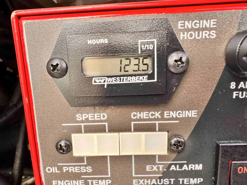 Slide: The Image of Engine hour meter showing 123.5 hours on a 2018 Boston Whaler 350 Outrage. - 37