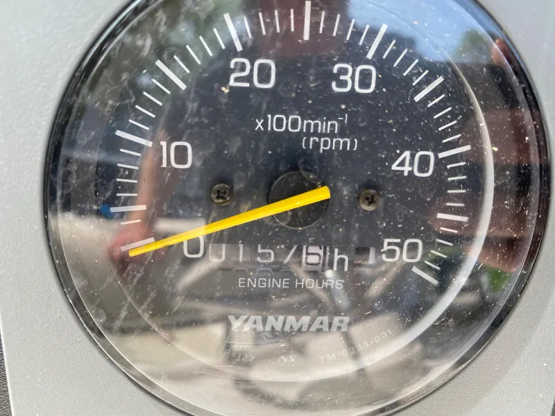 Slide: The Image of Tachometer of 1982 Mako 23 Inboard Diesel, showing engine hours and RPM. - 29