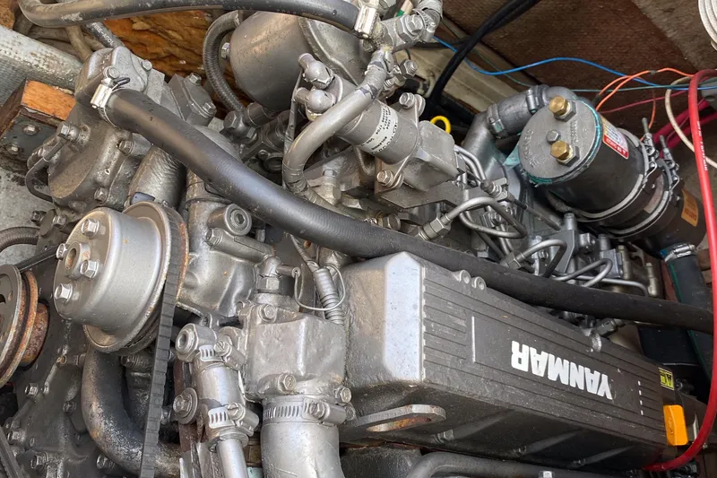 Slide: The Image of 1982 Mako 23 Inboard Diesel engine, detailed view of Yanmar components. - 40