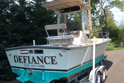 Slide: The Image of 1982 Mako 23 Inboard Diesel boat named "Defiance" on trailer, Islip, New York. - 5