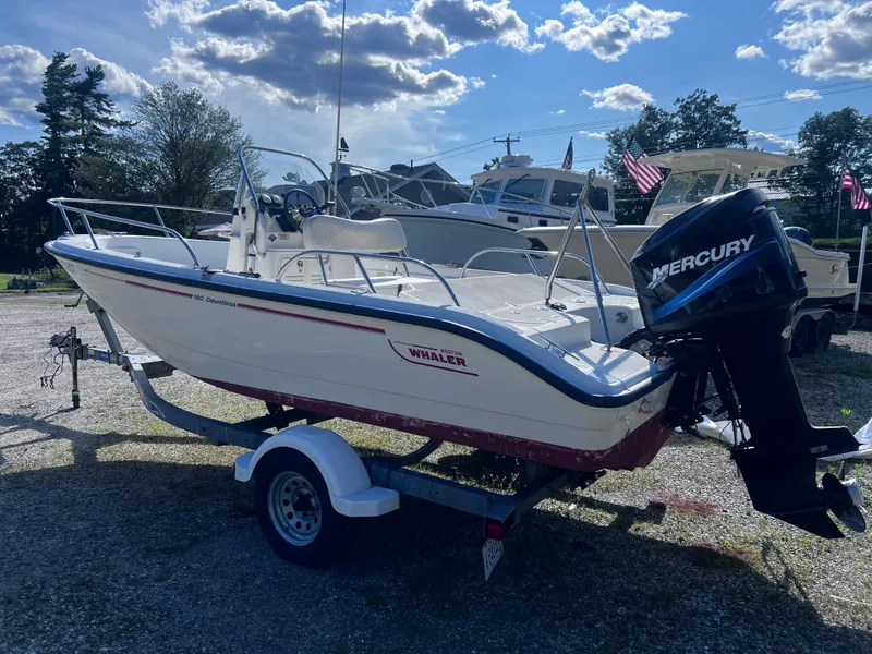 Slide: The Image of 2003 Boston Whaler 180 Dauntless boat on trailer with Mercury outboard motor. - 6