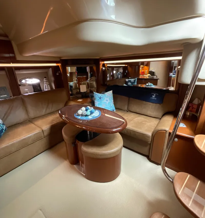 Slide: The Image of Luxurious interior of 2005 Sea Ray 500 Sundancer yacht with plush seating and elegant decor. - 19