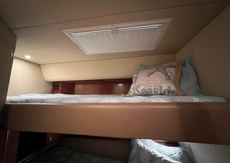 Slide: The Image of Cozy cabin bunk bed in 2005 Sea Ray 500 Sundancer yacht interior. - 21