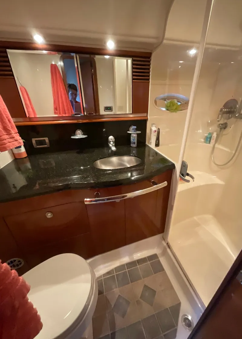 Slide: The Image of Luxurious bathroom in 2005 Sea Ray 500 Sundancer yacht with modern fixtures. - 25