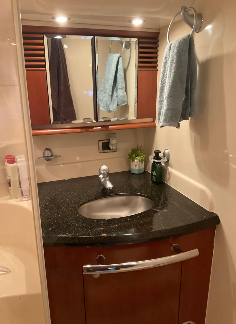 Slide: The Image of Luxurious bathroom in a 2005 Sea Ray 500 Sundancer yacht with modern fixtures. - 26