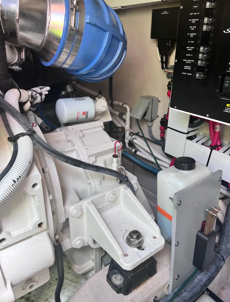 Slide: The Image of Engine room of 2005 Sea Ray 500 Sundancer with visible components and wiring. - 40