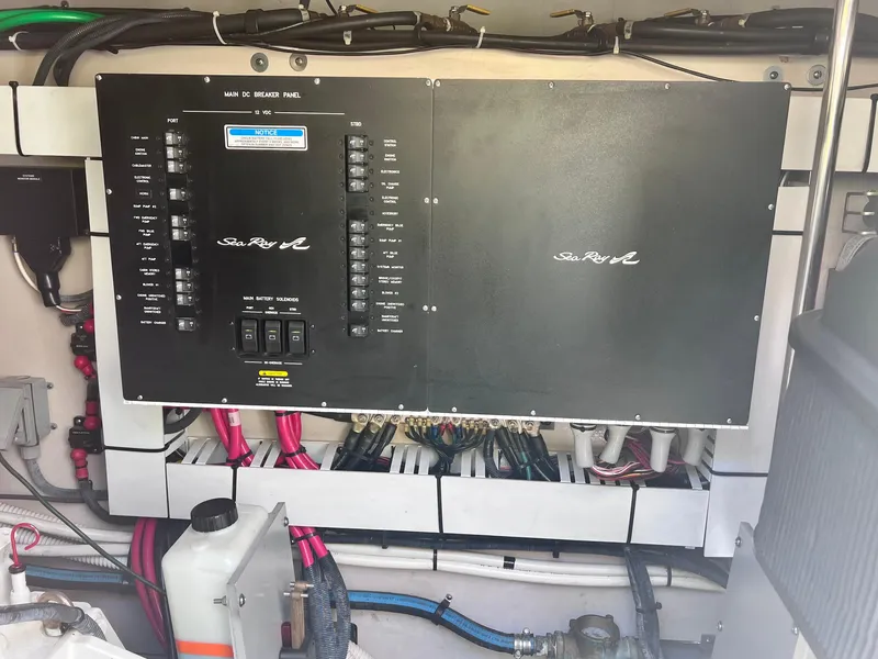 Slide: The Image of Main DC breaker panel of 2005 Sea Ray 500 Sundancer yacht, showcasing electrical components. - 41